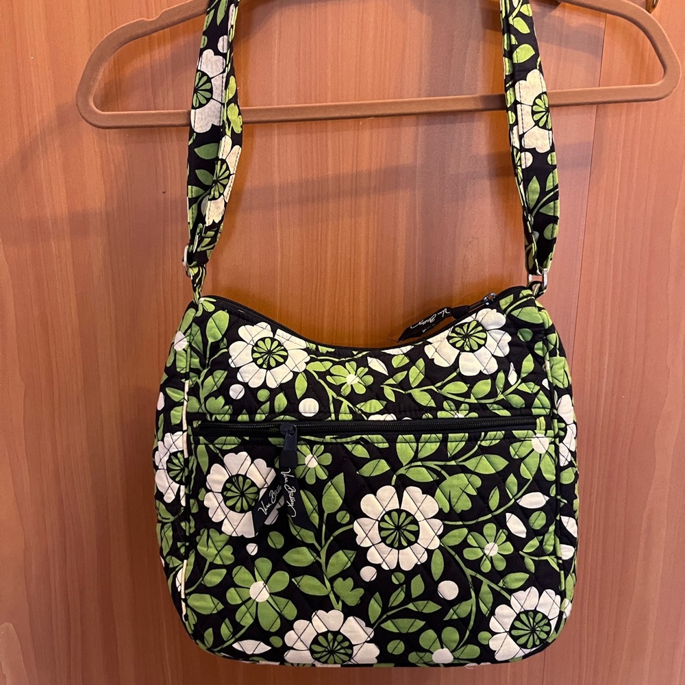 This item is a Vera Bradley quilted crossbody shoulder bag in the "Lucky You"